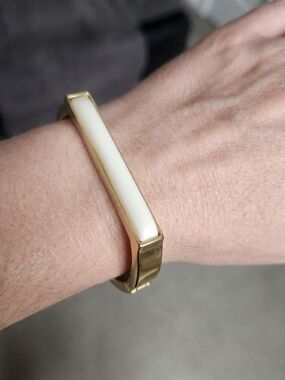 Gold Toned Bracelet with White Bangle Hinge Clasp Closure